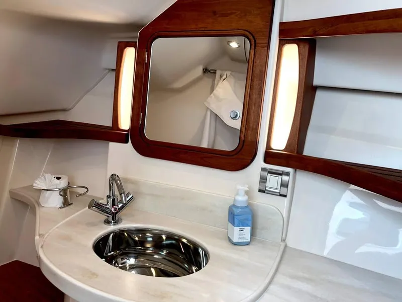 Slide: The Image of Luxurious 2023 Grady-White Freedom 375 boat bathroom with modern sink and mirror. - 41
