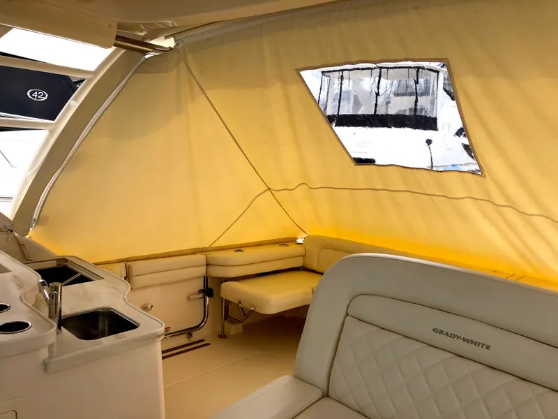 Slide: The Image of Interior of 2023 Grady-White Freedom 375 boat with seating and kitchenette. - 43