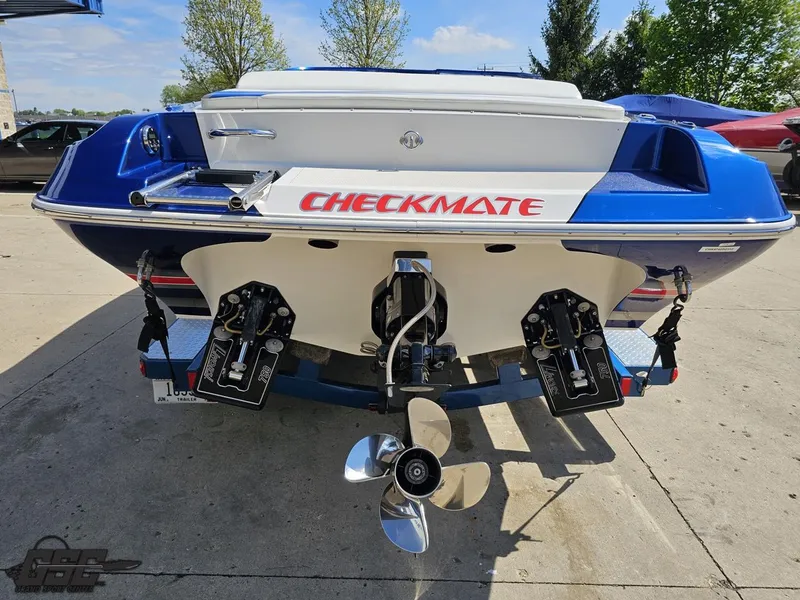 Slide: The Image of Rear view of 2012 Checkmate ZT 230 BR boat with dual propellers. - 28