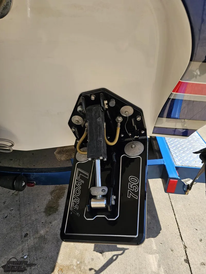 Slide: The Image of Checkmate ZT 230 BR 2012 boat with Imor 750 engine component on trailer. - 34