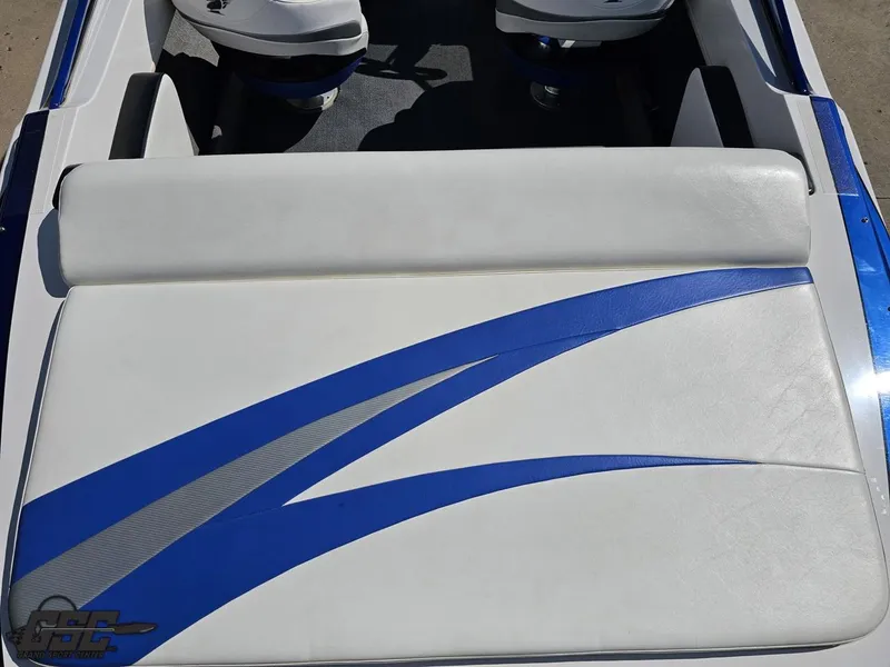 Slide: The Image of 2012 Checkmate ZT 230 BR boat interior with blue and white upholstery design. - 39