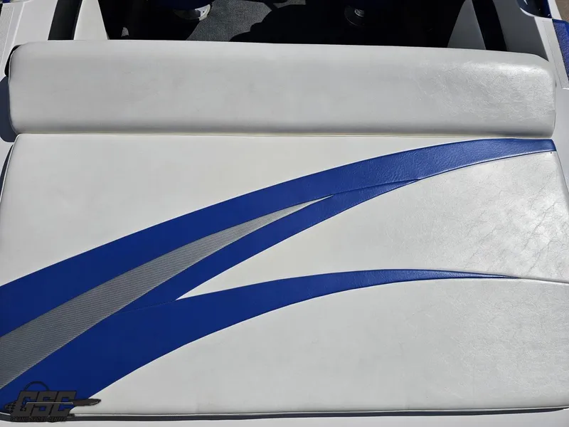 Slide: The Image of White and blue boat seat from 2012 Checkmate ZT 230 BR model. - 41