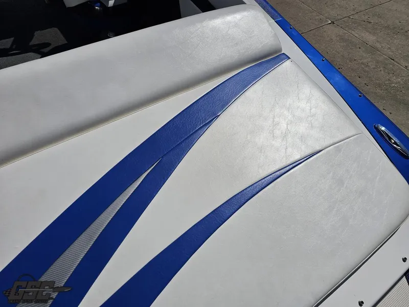 Slide: The Image of White and blue seating of 2012 Checkmate ZT 230 BR boat. - 43