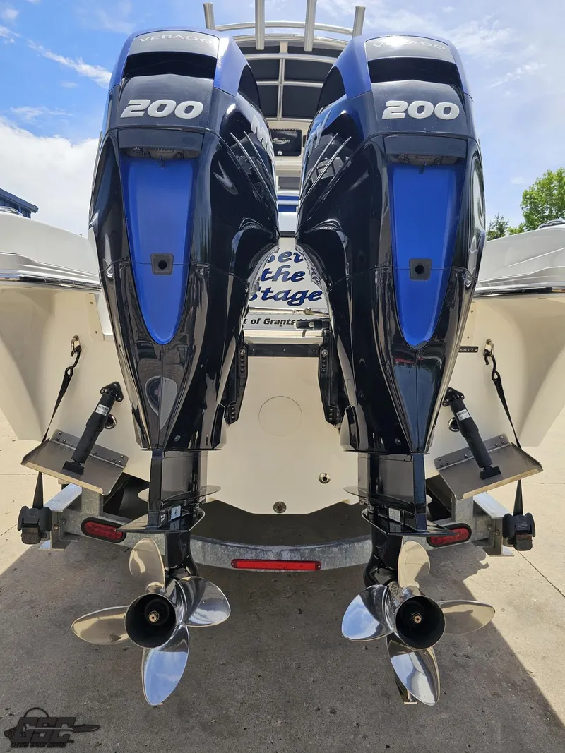 Slide: The Image of 2017 Sunsation 29 CCX boat with twin 200 horsepower outboard engines. - 27