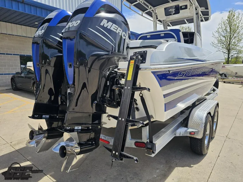 Slide: The Image of 2017 Sunsation 29 CCX boat with dual Mercury engines on a trailer. - 31