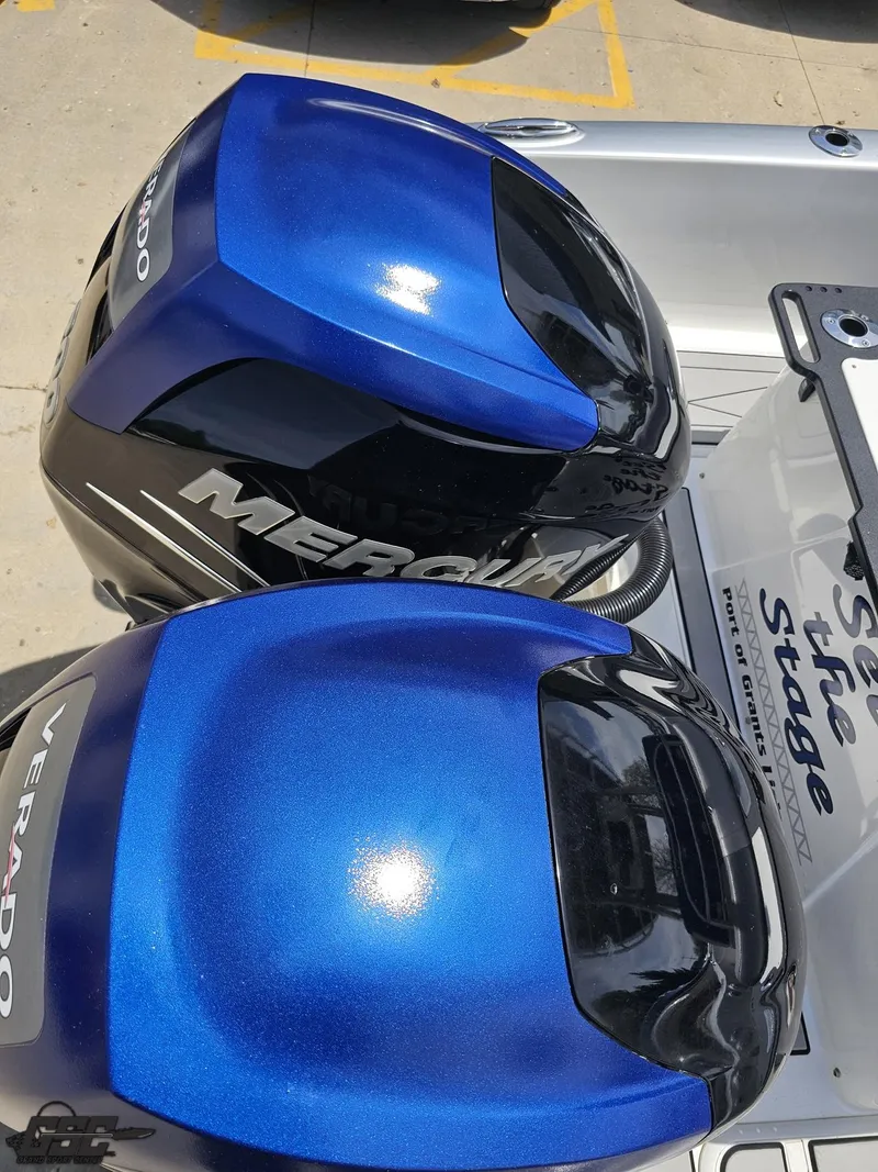 Slide: The Image of Twin blue Mercury Verado outboard engines on a 2017 Sunsation 29 CCX boat. - 35