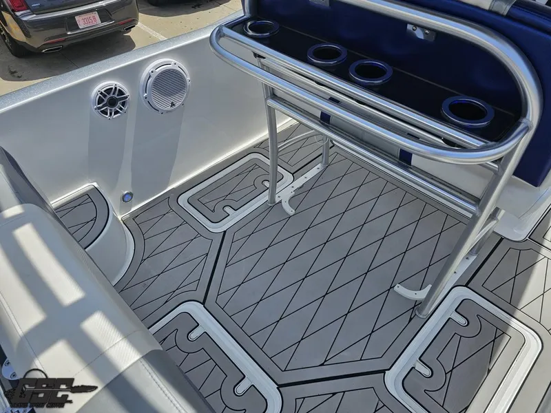 Slide: The Image of 2017 Sunsation 29 CCX boat interior with custom flooring and cup holders. - 43