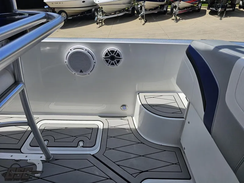 Slide: The Image of 2017 Sunsation 29 CCX boat interior with speakers and seating, showcasing modern design. - 46