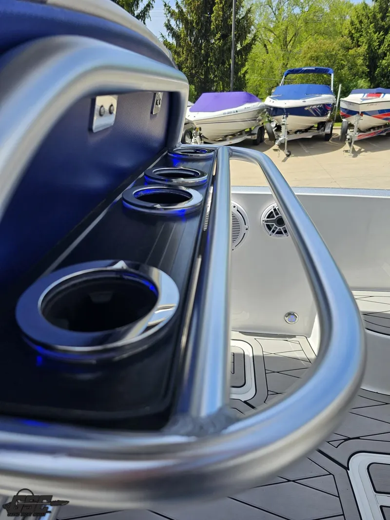 Slide: The Image of 2017 Sunsation 29 CCX boat interior with cup holders and sleek design. - 48