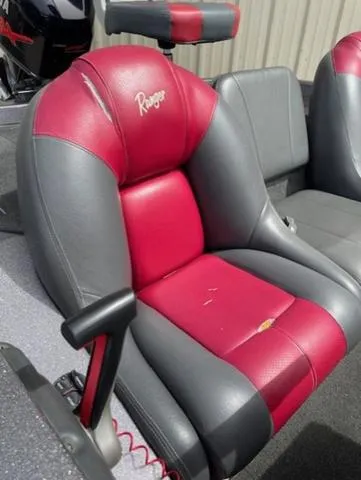 Slide: The Image of Red and gray seats in a 2011 Ranger 188 VX boat interior. - 11