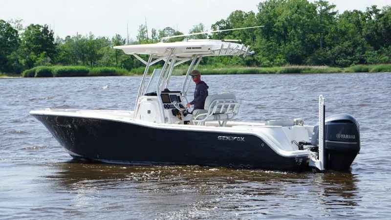 Slide: The Image of 2021 Sea Fox 248 Commander boat on water, featuring Yamaha outboard motor. - 1