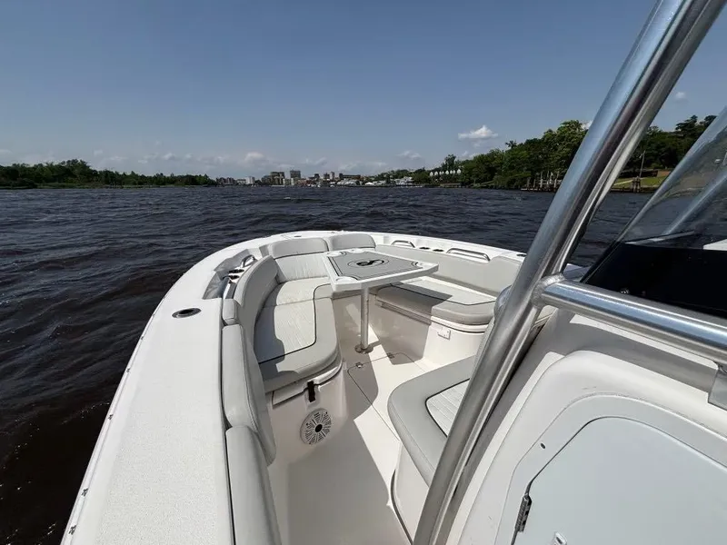 Slide: The Image of 2021 Sea Fox 248 Commander boat on calm water, featuring spacious seating and sleek design. - 15