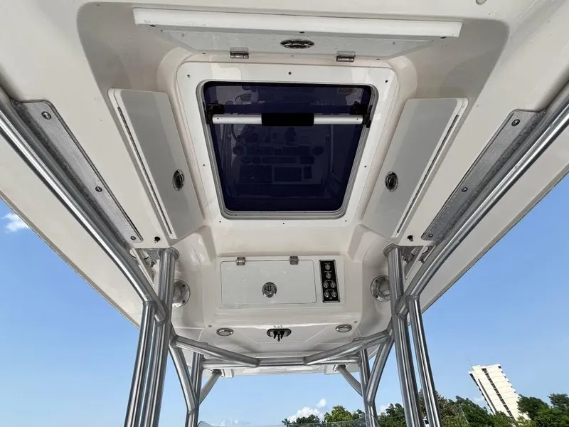 Slide: The Image of 2021 Sea Fox 248 Commander boat interior ceiling with hatch and storage compartments. - 8
