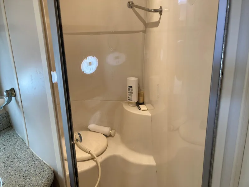 Slide: The Image of Shower area in 2001 Carver 396 Aft Cabin yacht with toiletries. - 40