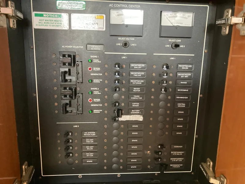 Slide: The Image of Electrical control panel of a 2001 Carver 396 Aft Cabin boat. - 43