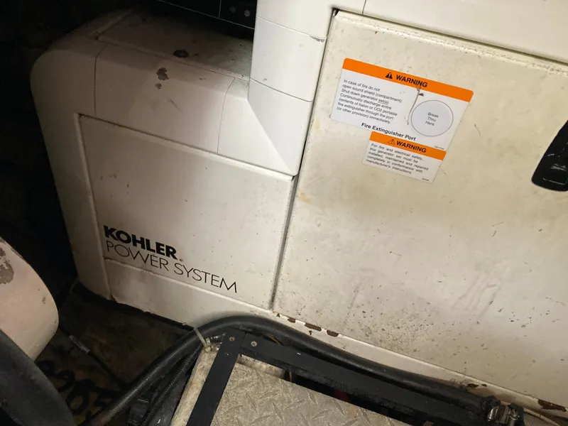 Slide: The Image of Kohler power system in 2001 Carver 396 Aft Cabin boat engine room. - 47