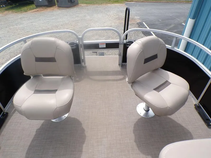 Slide: The Image of 2021 Sun Tracker BASS BUGGY® 16 DLX pontoon boat with two beige swivel seats. - 11