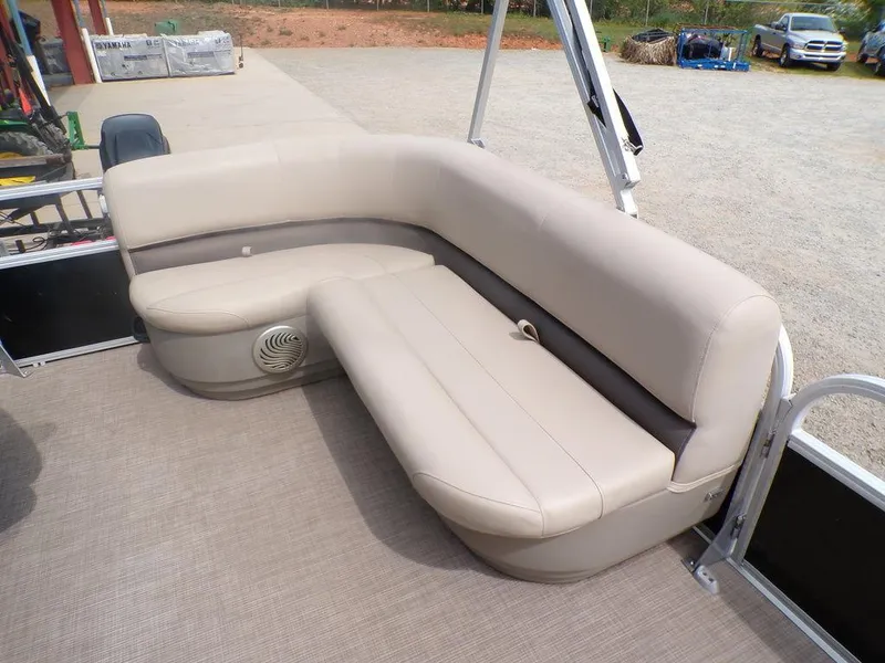 Slide: The Image of 2021 Sun Tracker BASS BUGGY® 16 DLX pontoon boat seating area with beige upholstery. - 15