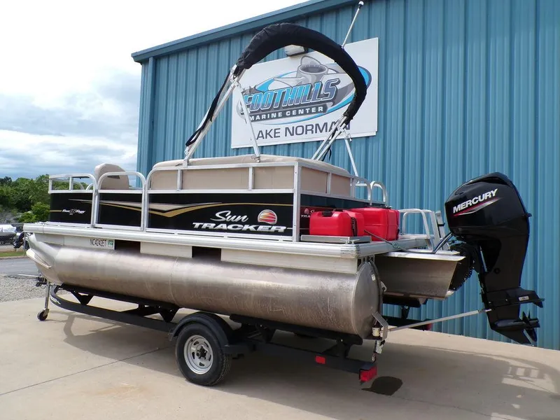 Slide: The Image of 2021 Sun Tracker BASS BUGGY® 16 DLX pontoon boat with Mercury outboard motor. - 5