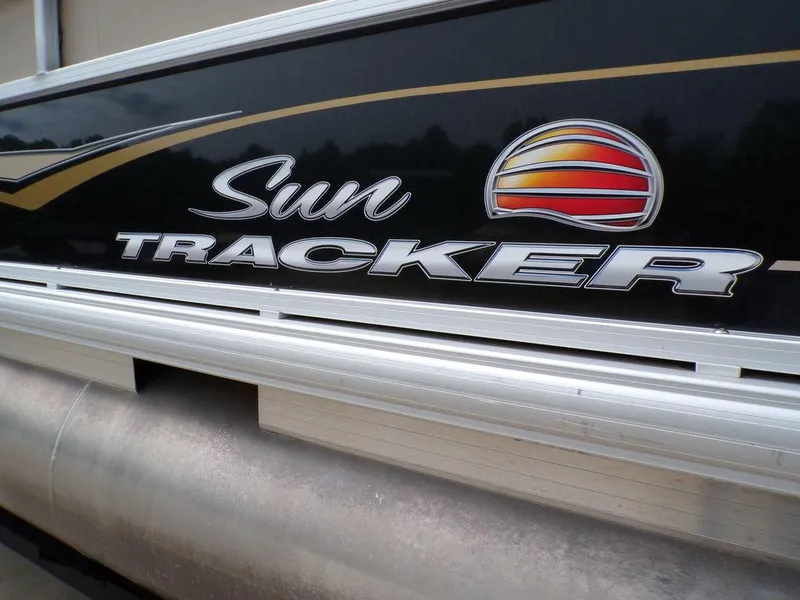 Slide: The Image of 2021 Sun Tracker BASS BUGGY® 16 DLX logo on boat exterior. - 6
