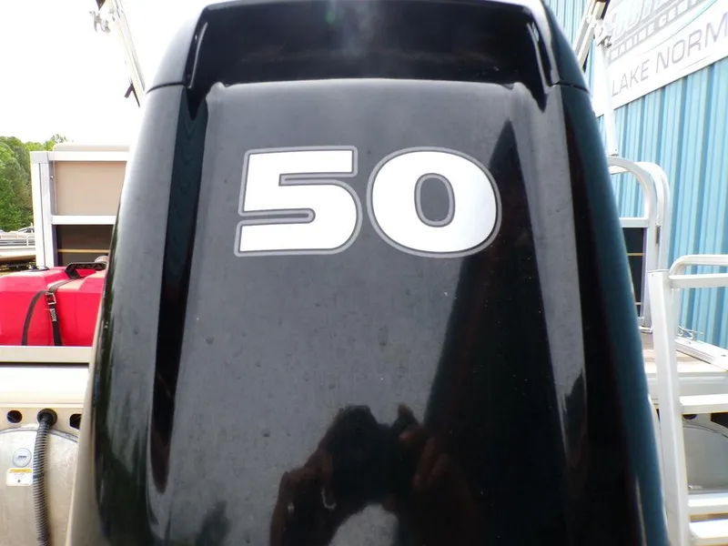 Slide: The Image of Outboard motor with "50" label on a 2021 Sun Tracker BASS BUGGY® 16 DLX. - 8