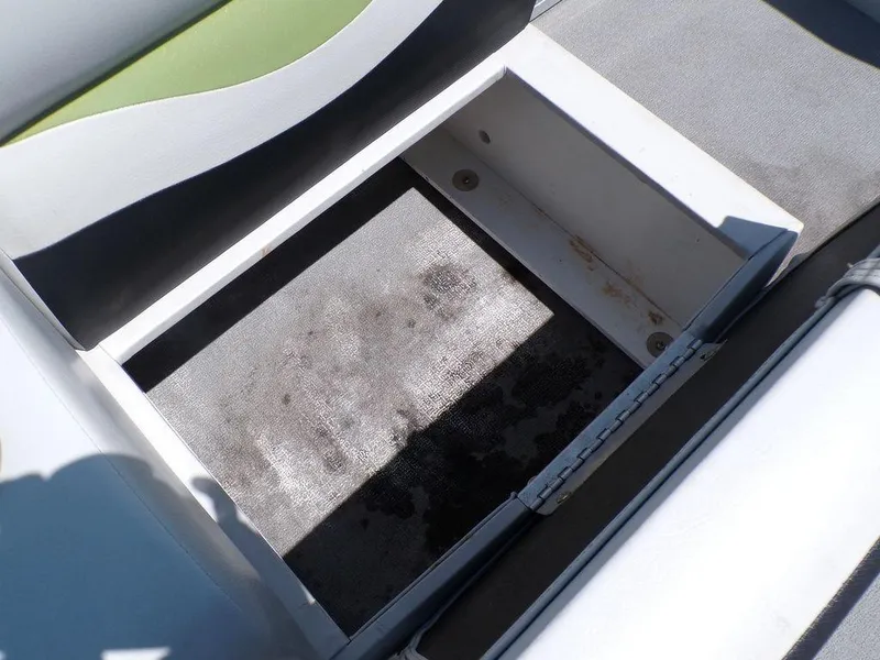 Slide: The Image of Storage compartment on a 2020 Qwest Edge 816 Cruise boat. - 10