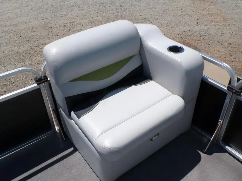 Slide: The Image of 2020 Qwest Edge 816 Cruise boat seat with cup holder, featuring white and green upholstery. - 12