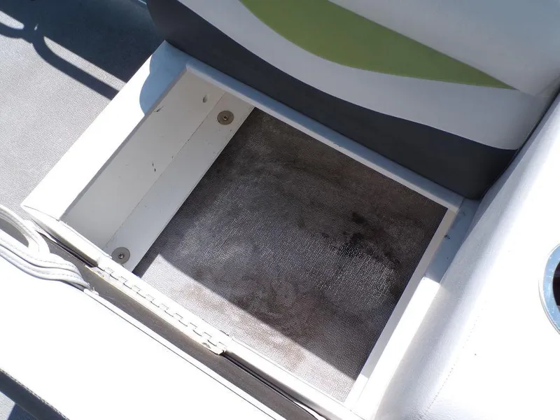 Slide: The Image of Open storage compartment on 2020 Qwest Edge 816 Cruise boat. - 13