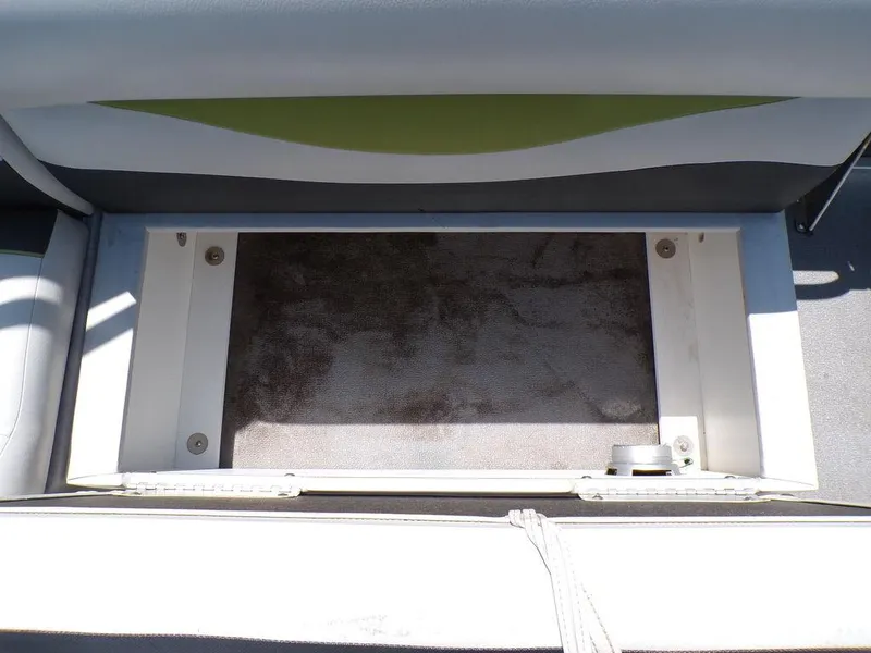 Slide: The Image of Storage compartment on a 2020 Qwest Edge 816 Cruise boat. - 18