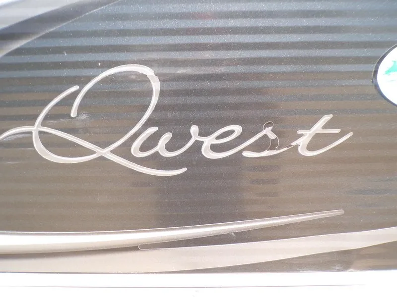 Slide: The Image of Qwest Edge 816 Cruise 2020 logo on a sleek, metallic surface. - 8