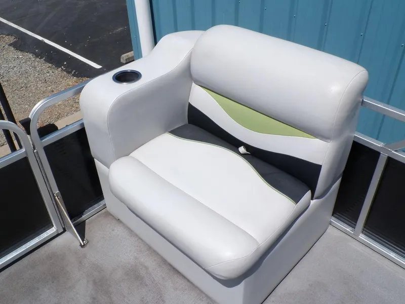 Slide: The Image of 2020 Qwest Edge 816 Cruise boat seat with cup holder, white and green accents. - 9