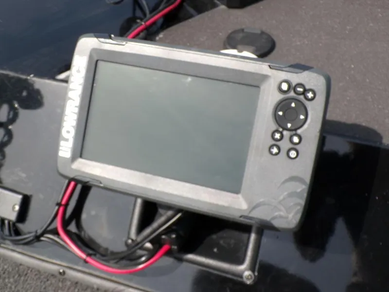 Slide: The Image of Fishfinder device on a 2014 Lowe Stinger ST195 boat dashboard. - 12