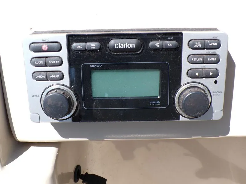 Slide: The Image of Clarion CMD7 stereo system on a 2013 JC Limited 221 Triple boat. - 19
