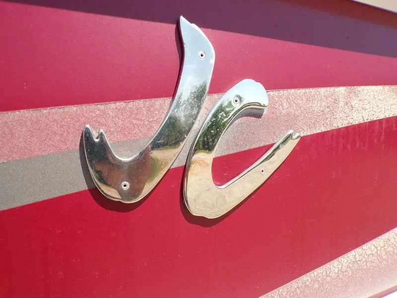 Slide: The Image of 2013 JC Limited 221 Triple logo on red background. - 8