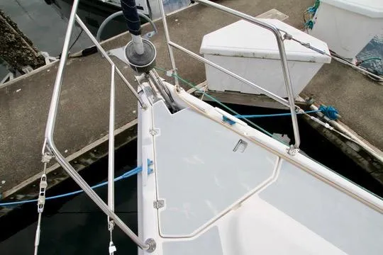 Slide: The Image of Bow of 2001 Hunter Passage 420 sailboat docked at marina. - 11