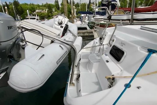 Slide: The Image of 2001 Hunter Passage 420 yacht with dinghy at marina. - 15