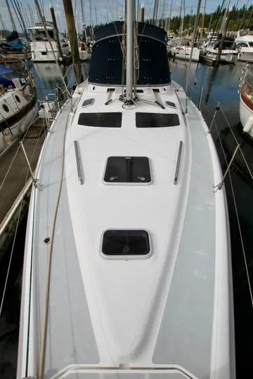 Slide: The Image of 2001 Hunter Passage 420 sailboat docked in marina, top deck view. - 19