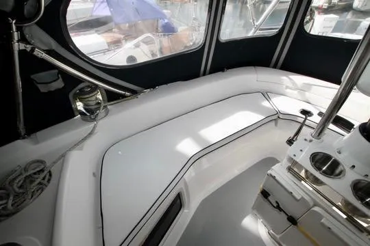 Slide: The Image of Interior view of 2001 Hunter Passage 420 sailboat cockpit with seating and equipment. - 29