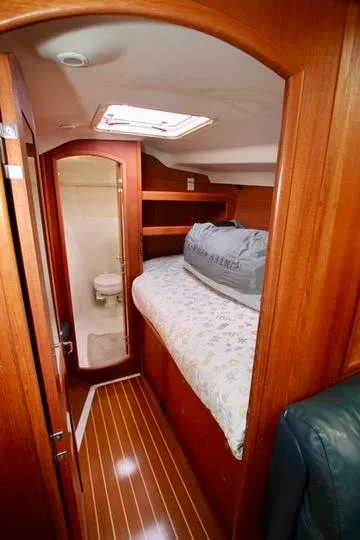 Slide: The Image of 2001 Hunter Passage 420 yacht interior with cozy cabin and wooden finish. - 41