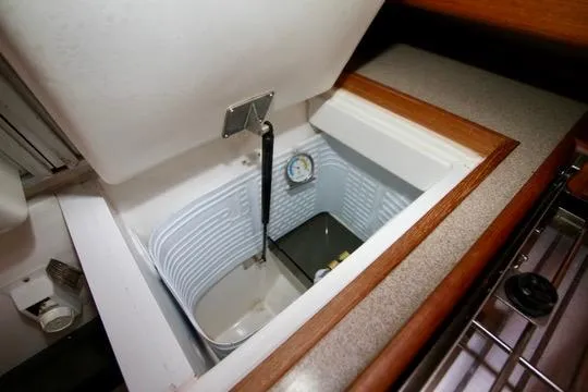 Slide: The Image of Interior view of a 2001 Hunter Passage 420 yacht's built-in cooler compartment. - 43