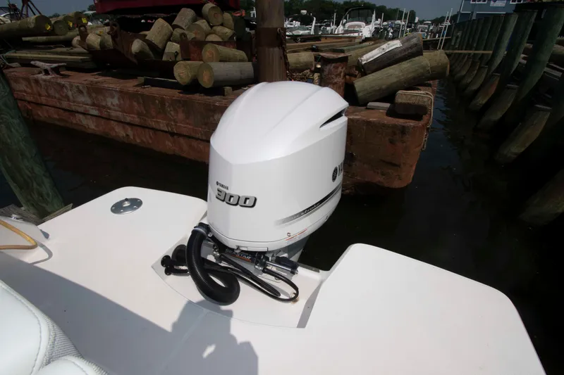 Slide: The Image of 2020 Regal 26 XO boat with Yamaha 300 outboard motor at dock. - 10