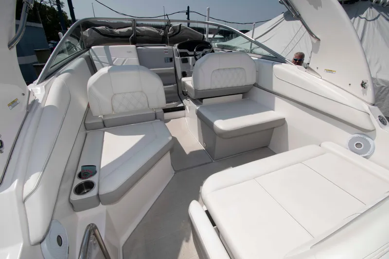 Slide: The Image of 2020 Regal 26 XO boat interior with white seating and modern design. - 4