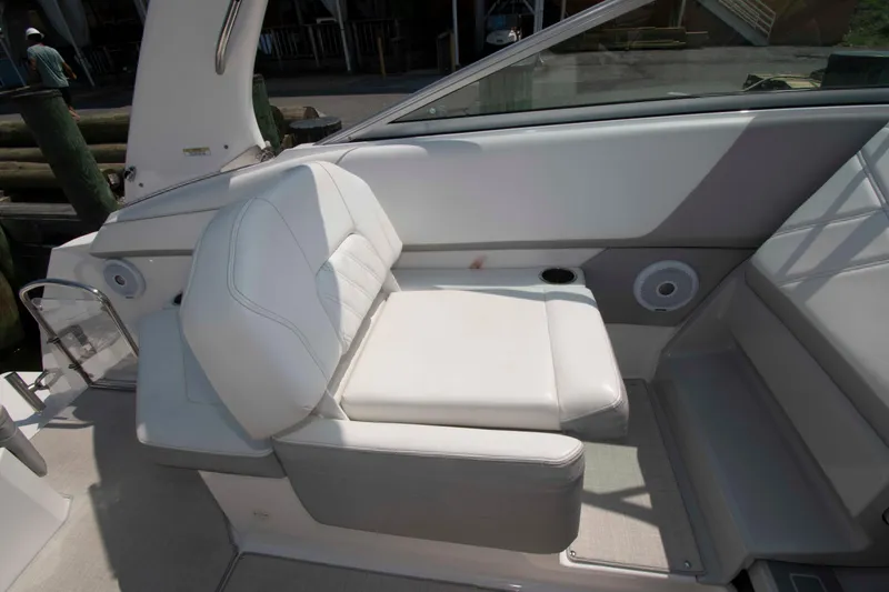 Slide: The Image of 2020 Regal 26 XO boat interior with white seating and modern design. - 8