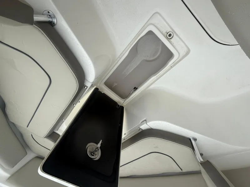 Slide: The Image of 2024 Key West 239 FS boat interior storage compartments and seating. - 9