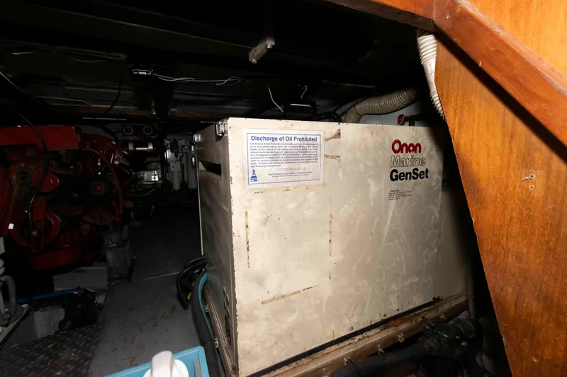 Slide: The Image of Engine room of 1988 Marine Trader 48 Trawler with Onan Marine GenSet. - 28