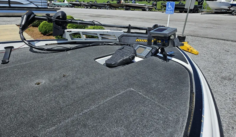 Slide: The Image of 2008 Triton 18X2 boat with trolling motor and fishfinder on deck. - 4