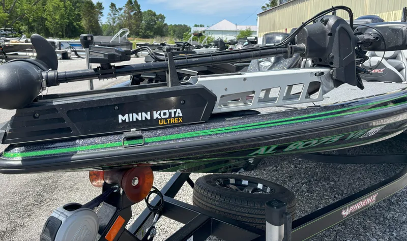 Slide: The Image of 2019 Phoenix 920 PRO XP boat with Minn Kota Ultrex trolling motor on trailer. - 13