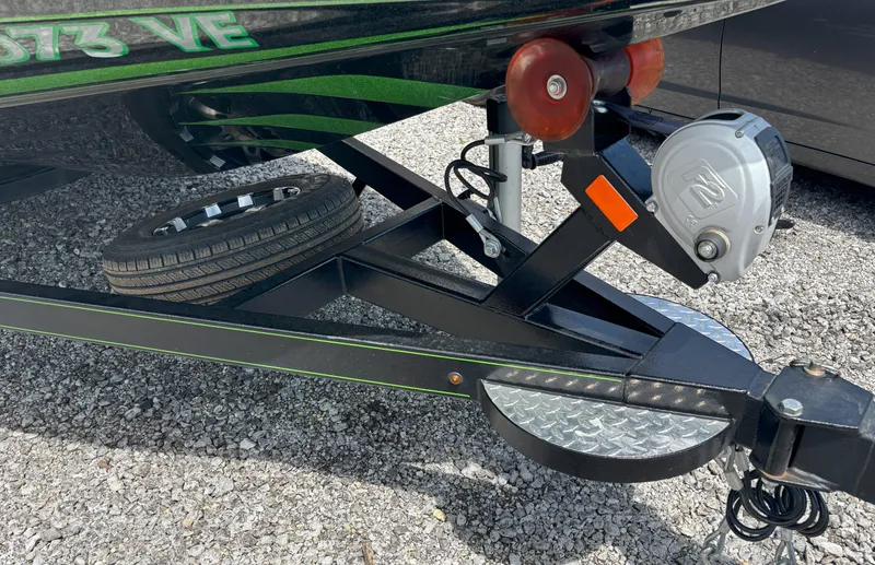 Slide: The Image of Trailer hitch of 2019 Phoenix 920 PRO XP boat with spare tire and winch. - 20