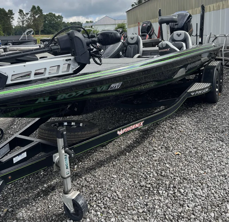 Slide: The Image of 2019 Phoenix 920 PRO XP boat on trailer, parked on gravel lot. - 21