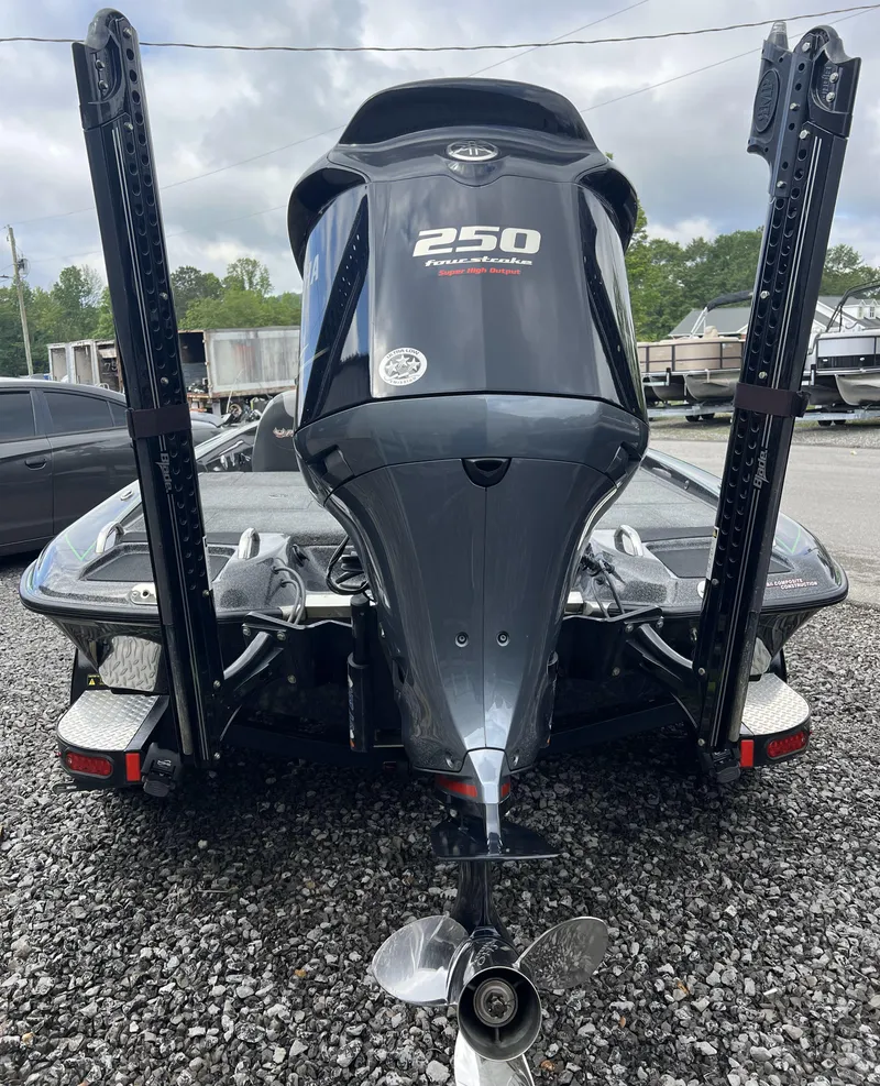 Slide: The Image of 2019 Phoenix 920 PRO XP boat with 250 horsepower engine, rear view on gravel. - 22